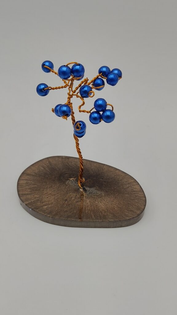 Árbol de Esencia Azul Silenciosa